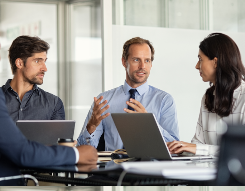 Business development team gathering to discuss asset-based lending strategies